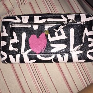 black wallet with white letters